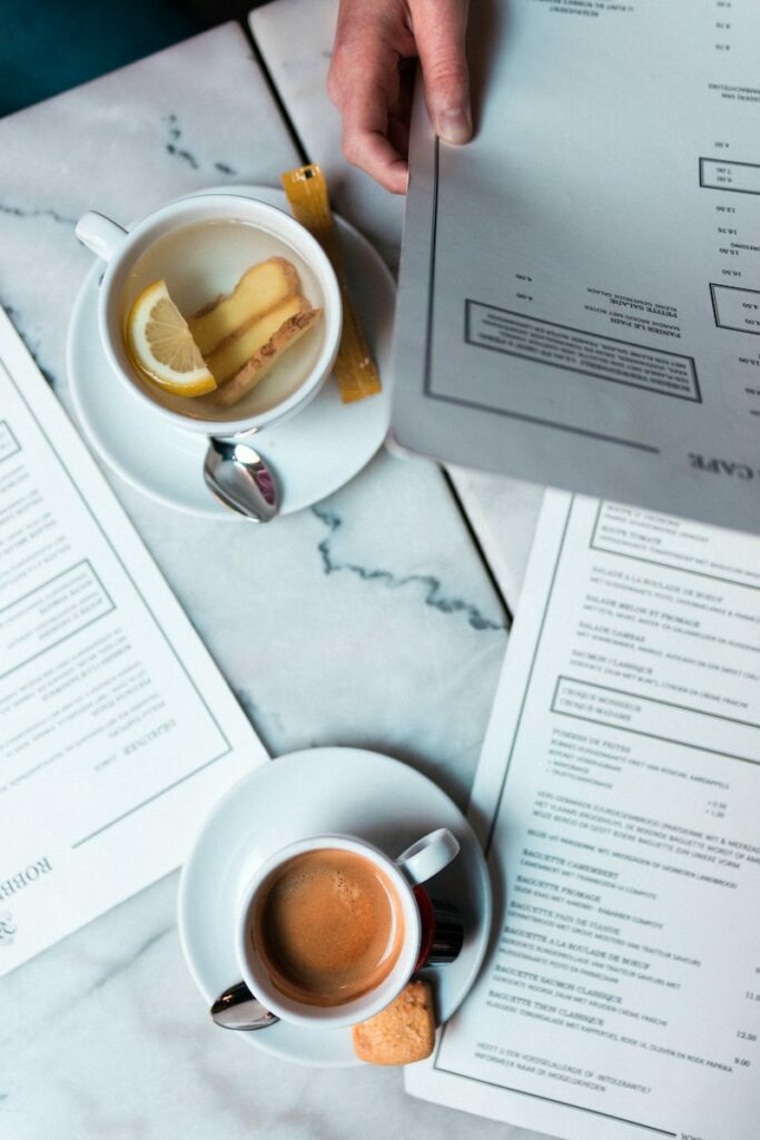 brown liquid in white ceramic mug