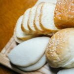 Assorted Breads over Wooden Board